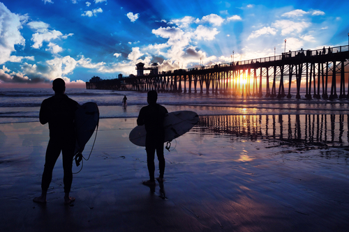 Surfers Watch Oceanside California Sunset