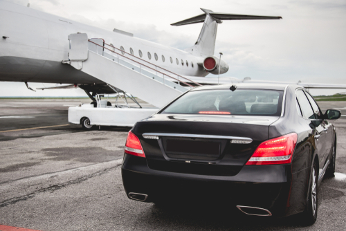 What are the benefits of hiring a car service for airport transportation?